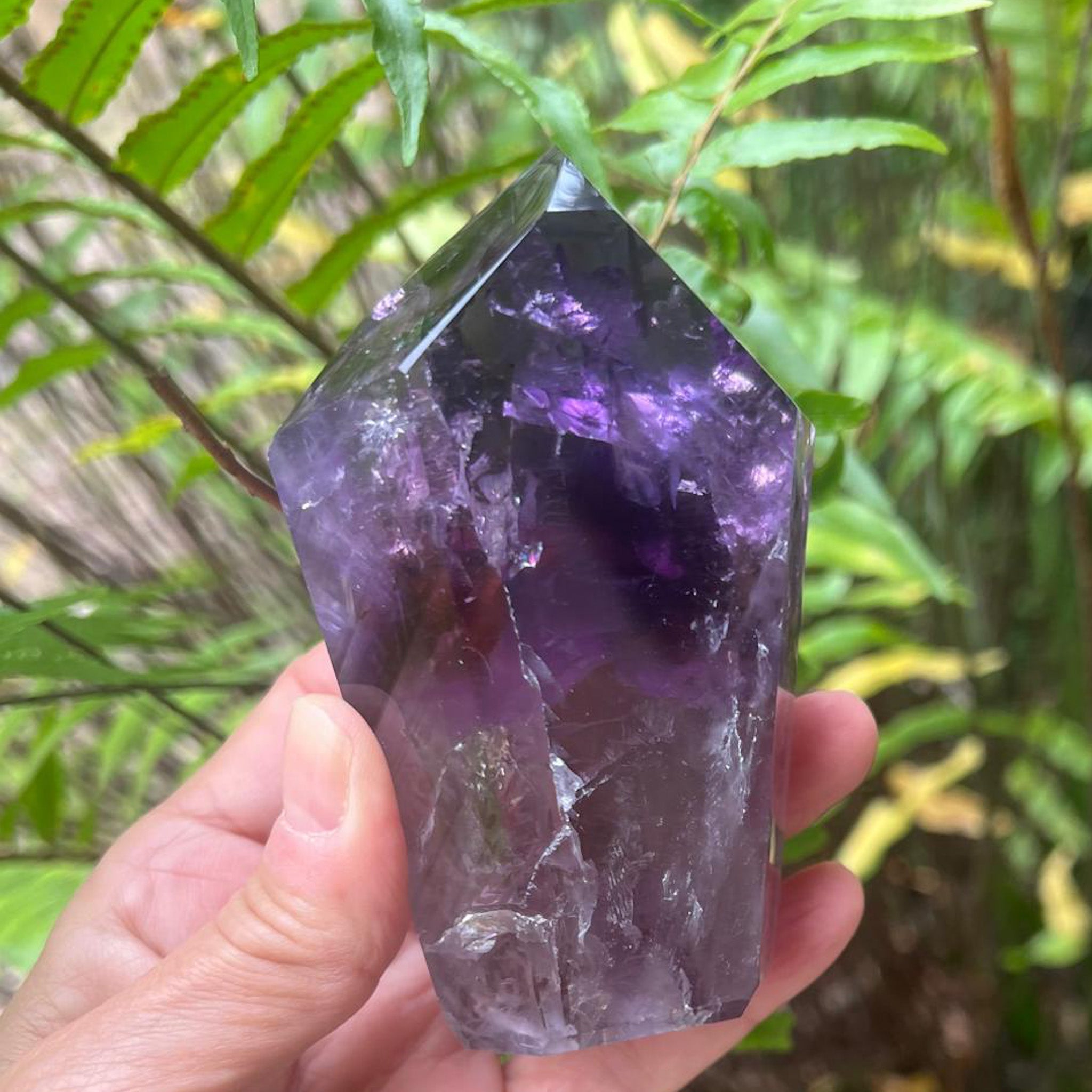 Natural purple Quartz crystal point