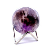 Translucent Amethyst sphere with layered purple colour