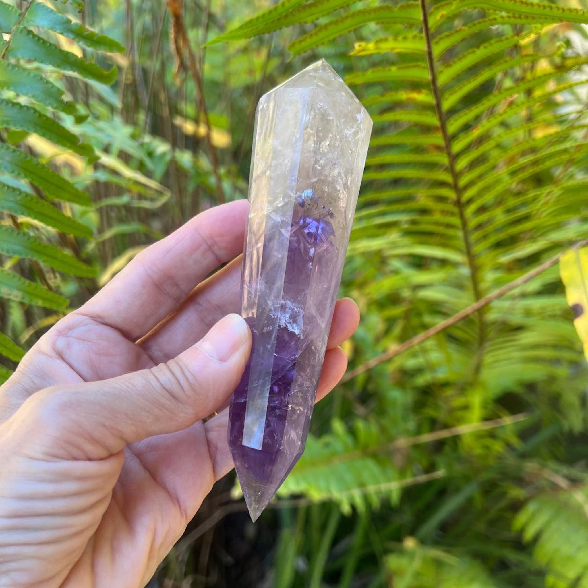 Purple and smoky double terminated crystal wand