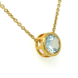 Blue Topaz Circular Gold Pendant