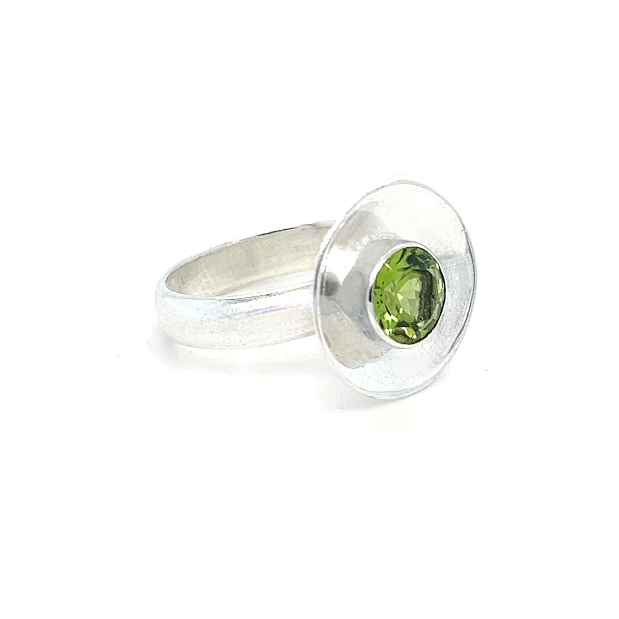 Circular Silver Feature Peridot Ring