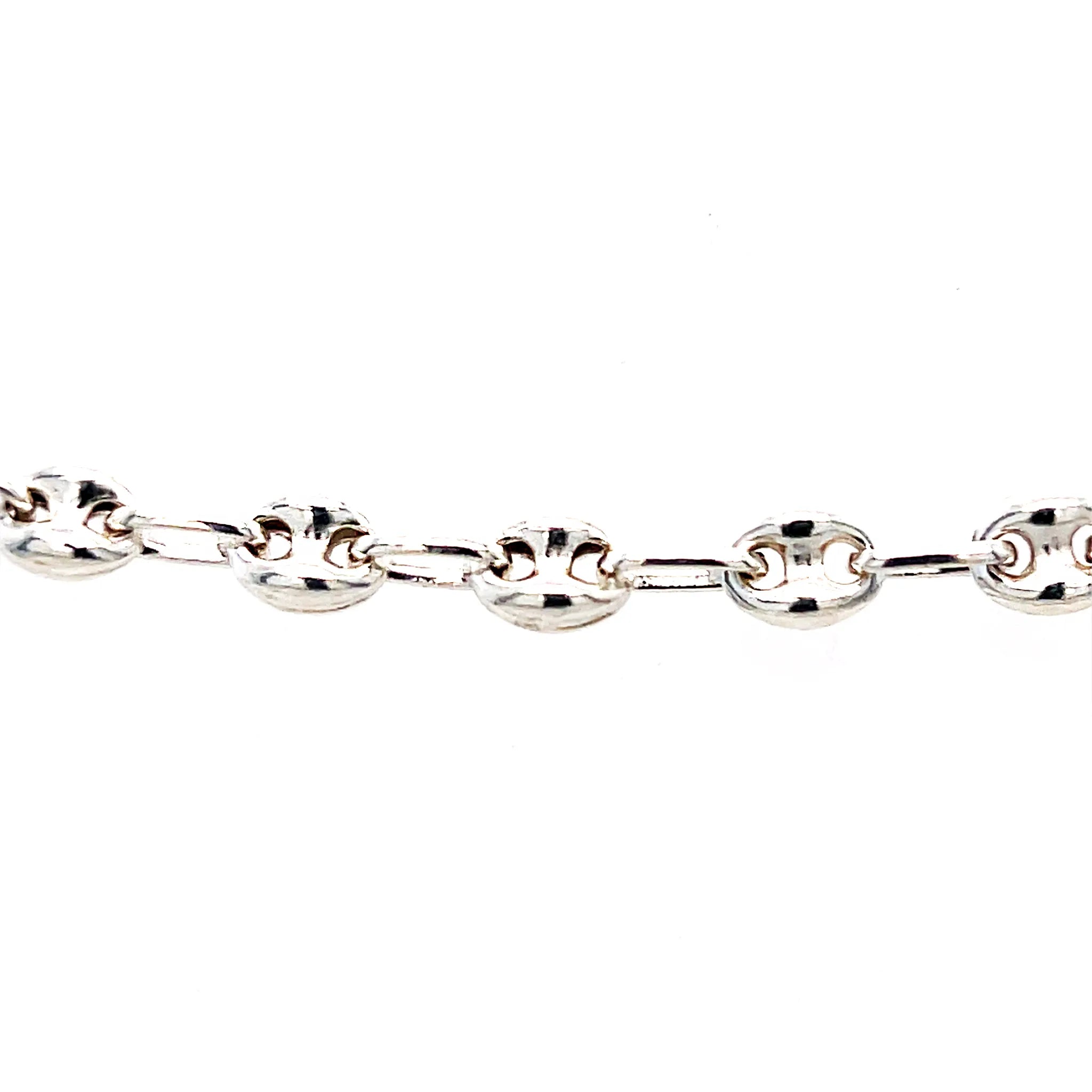 Silver anchor chain close up on a white background