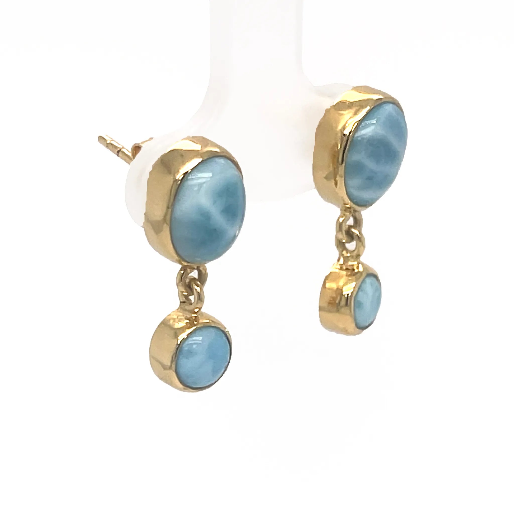 Gold plated Larimar earrings showing two natural blue gemstones