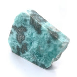 Genuine Larimar slice specimen showing web-like patterning and volcanic matrix