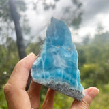 Genuine Larimar specimen from the Dominican Republic held in natural light