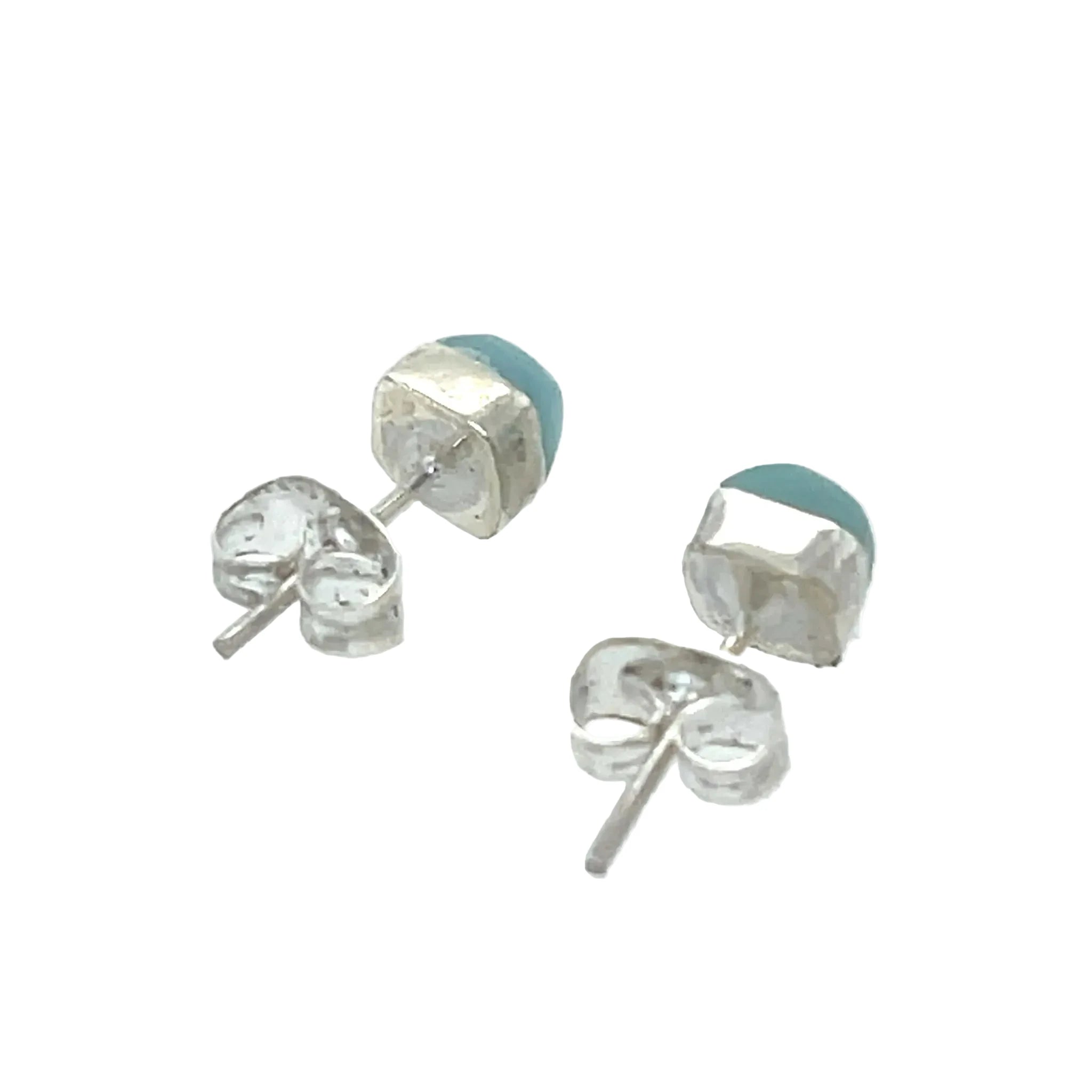 Natural Larimar stud earrings showing ocean-blue colour and silver setting