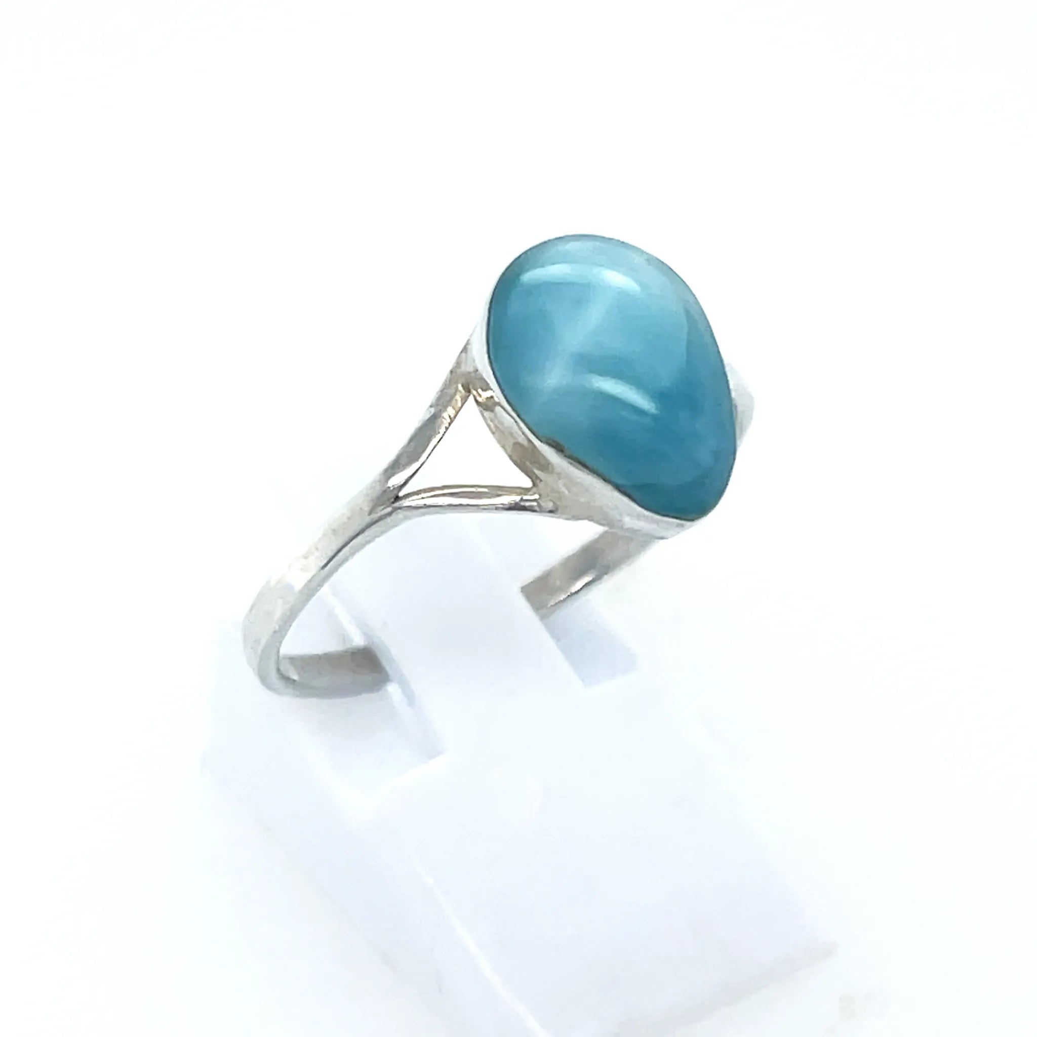 Larimar teardrop silver ring with ocean-blue natural gemstone