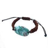 Natural Larimar bracelet with polished centrepiece and earthy cord design