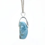     Side view of Dominican Republic Larimar pendant in silver setting