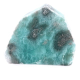 Natural Larimar slice specimen showing blue patterning and volcanic matrix