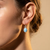 Larimar sterling silver drop earrings worn on model for scale and styling