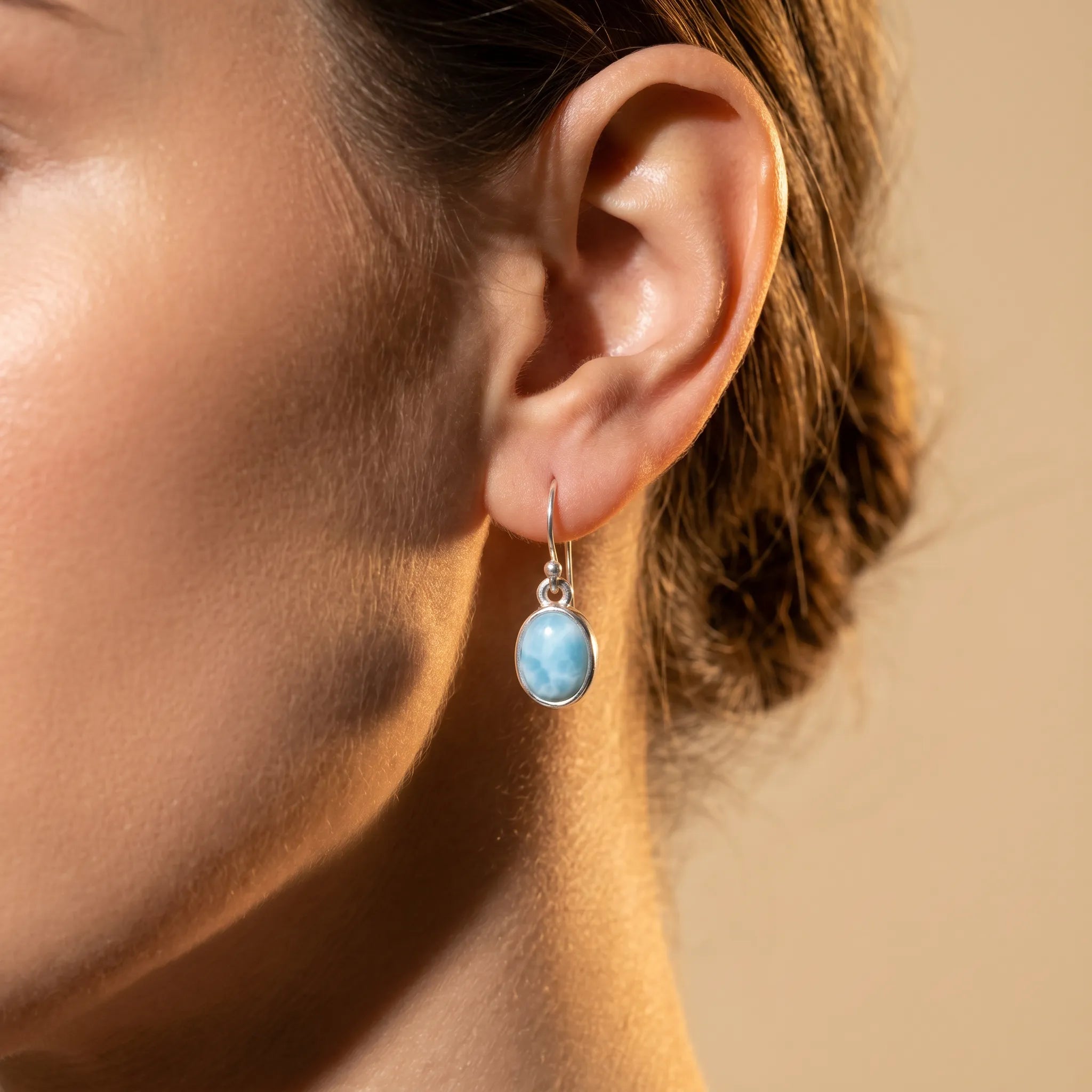 Larimar sterling silver drop earrings worn on model for scale and styling
